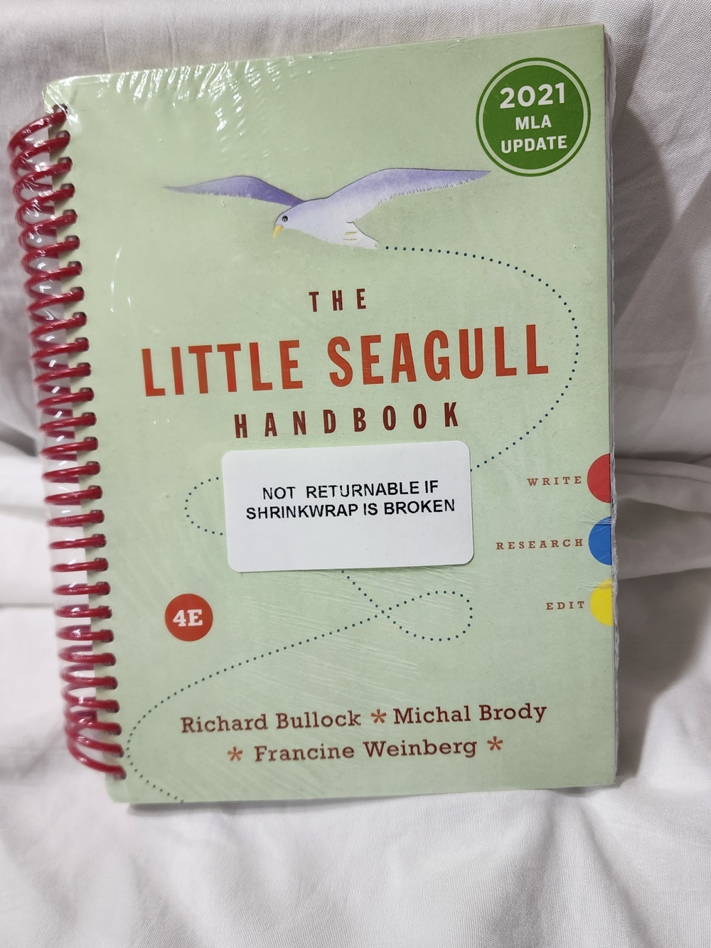 The Little Seagull Handbook in Light Green with Red Spiral